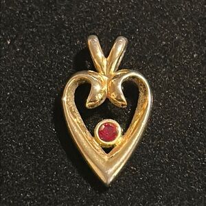 Gold Tone Heart Pendant with Red Gemstone